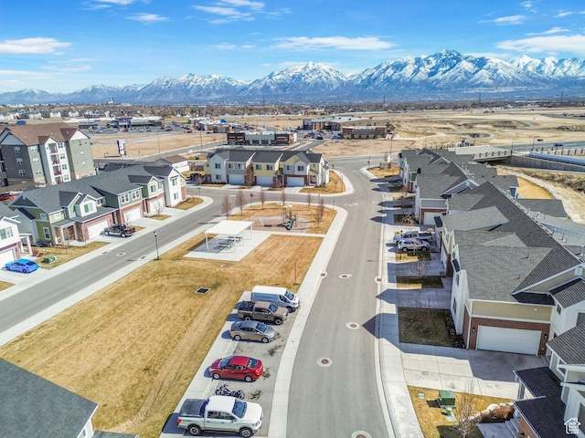 birds eye view of property featuring a mountain view and a residential view