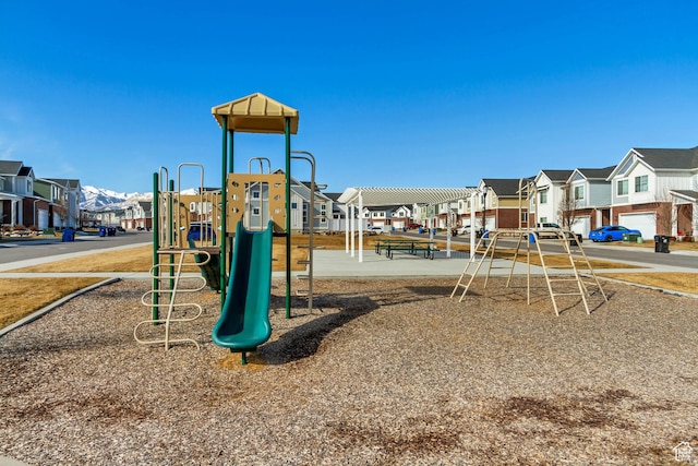 community jungle gym featuring a residential view