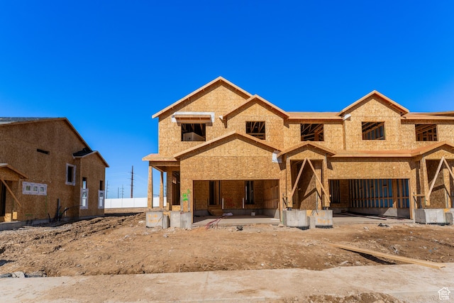 unfinished property featuring a patio area