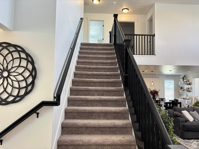 stairs with a high ceiling