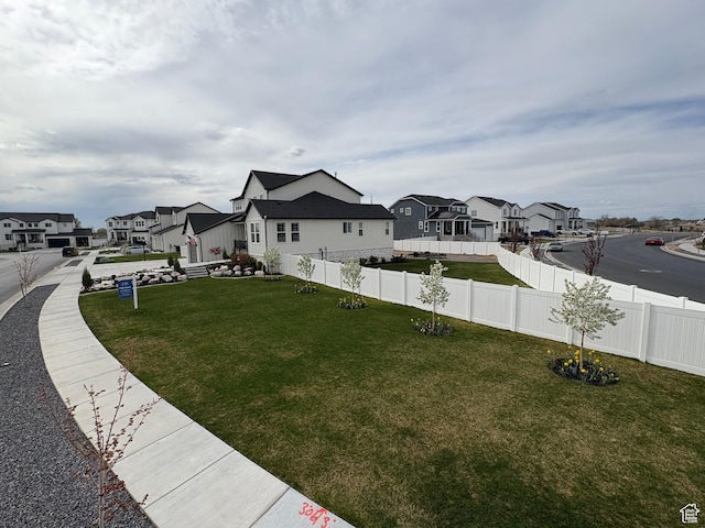 view of yard with fence private yard and a residential view
