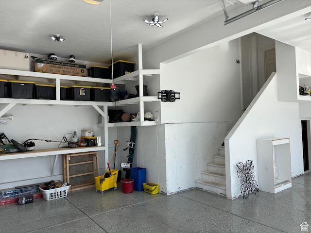 garage with a workshop area