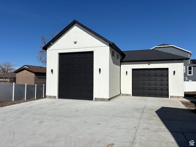 exterior space featuring fence and board and batten siding