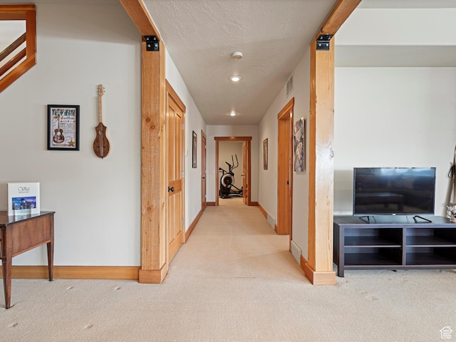 1173 S Innsbruck Dr, Huntsville, UT 84317 - hallway with visible vents, baseboards, recessed lighting, and light carpet