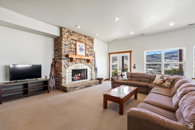 1173 S Innsbruck Dr, Huntsville, UT 84317 - carpeted living area with recessed lighting and a stone fireplace