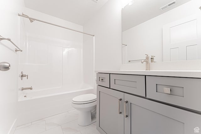 698 W 4500 S Unit 309, Mapleton, UT 84664 - bathroom with marble finish floors, toilet, vanity, and shower / tub combination
