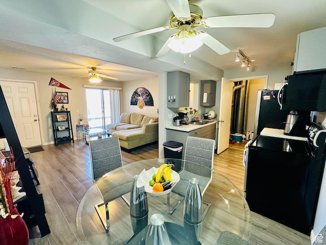 4110 S Oak Meadows Dr Unit 20, Taylorsville, UT 84123 - dining area with ceiling fan and light wood-style flooring