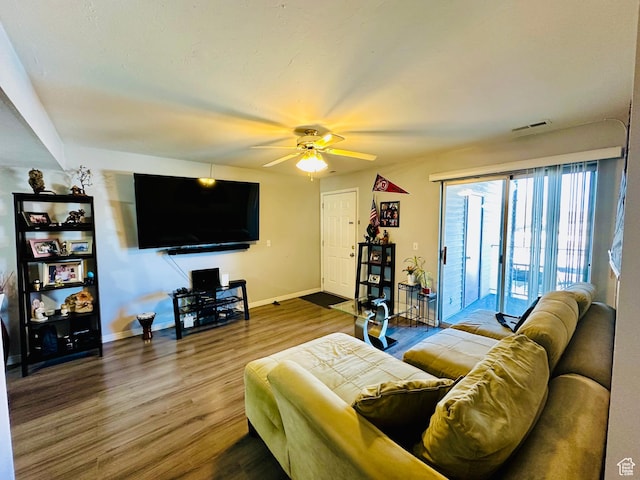 4110 S Oak Meadows Dr Unit 20, Taylorsville, UT 84123 - living room featuring visible vents, ceiling fan, baseboards, and wood finished floors