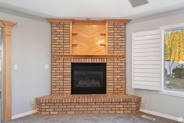 interior details featuring baseboards, carpet flooring, and visible vents