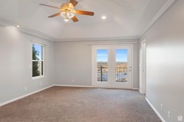 unfurnished room featuring ceiling fan, baseboards, carpet, and ornamental molding