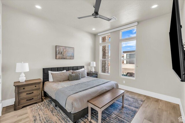 5159 W 2200 S, Hurricane, UT 84737 - bedroom with light wood-type flooring, baseboards, and visible vents