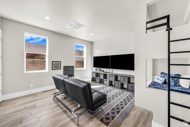 5159 W 2200 S, Hurricane, UT 84737 - living area featuring a wealth of natural light, visible vents, baseboards, and wood finished floors