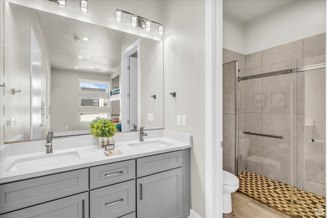 5159 W 2200 S, Hurricane, UT 84737 - full bathroom featuring double vanity, a sink, toilet, and a shower stall
