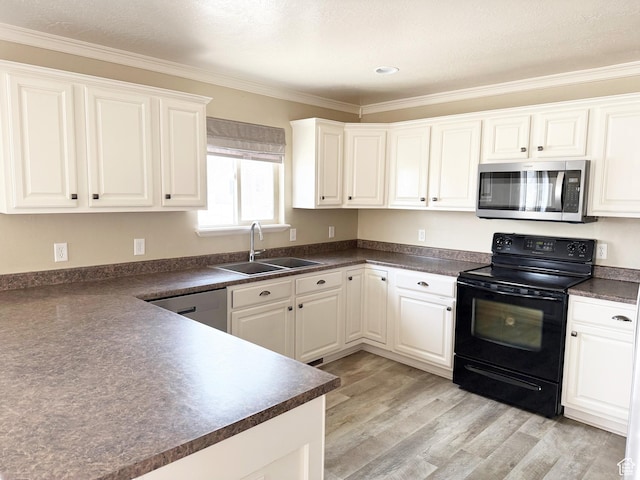 2825 S 400 W, Vernal, UT 84078 - kitchen featuring appliances with stainless steel finishes, a sink, dark countertops, ornamental molding, and light wood-style floors