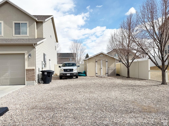 2825 S 400 W, Vernal, UT 84078 - view of home's exterior with driveway, an attached garage, and a shingled roof