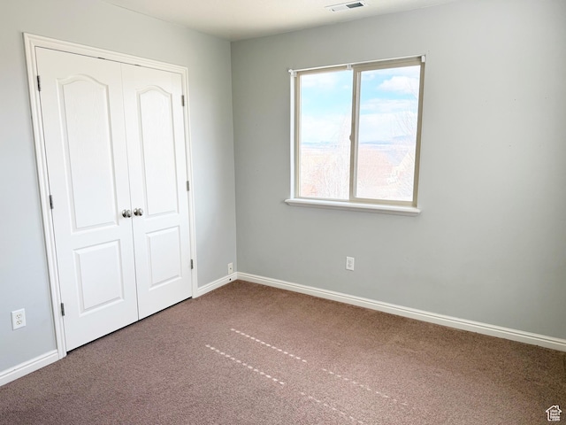 2825 S 400 W, Vernal, UT 84078 - unfurnished bedroom featuring carpet, baseboards, and a closet