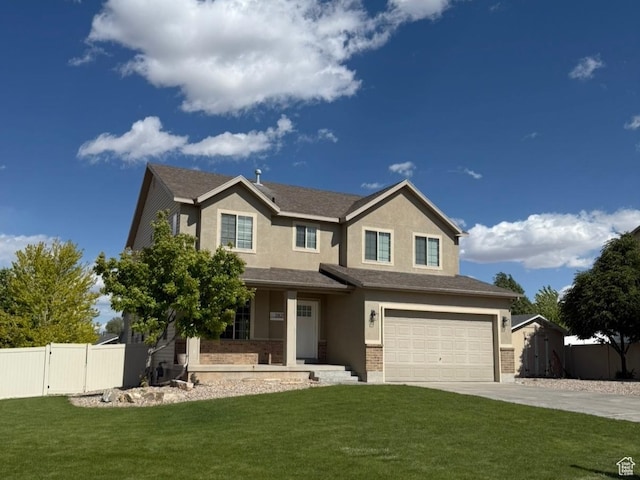 2825 S 400 W, Vernal, UT 84078 - view of front of home featuring concrete driveway, stucco siding, an attached garage, covered porch, and a gate