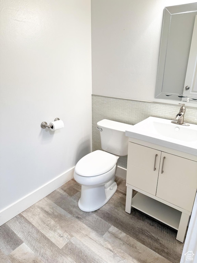 2825 S 400 W, Vernal, UT 84078 - bathroom with toilet, vanity, and wainscoting