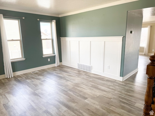 2825 S 400 W, Vernal, UT 84078 - empty room with a decorative wall, wood finished floors, crown molding, and wainscoting