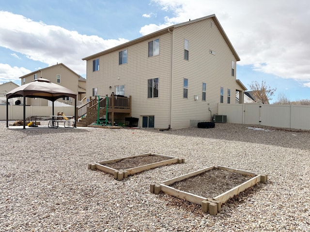 2825 S 400 W, Vernal, UT 84078 - back of house with a gazebo, a garden, and a gate