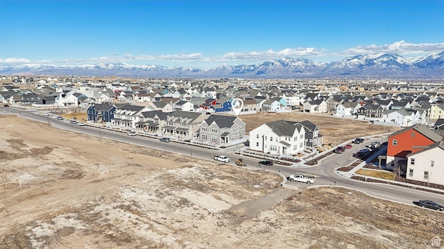 aerial view with a mountain view and a residential view