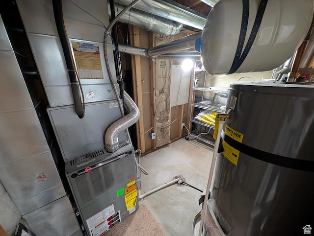 utilities featuring strapped water heater and heating unit