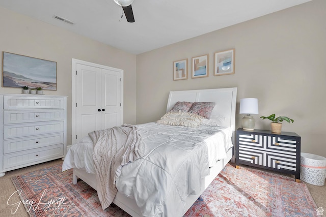 395 W Granite Dr, Washington, UT 84780 - bedroom featuring carpet floors, a ceiling fan, and a closet