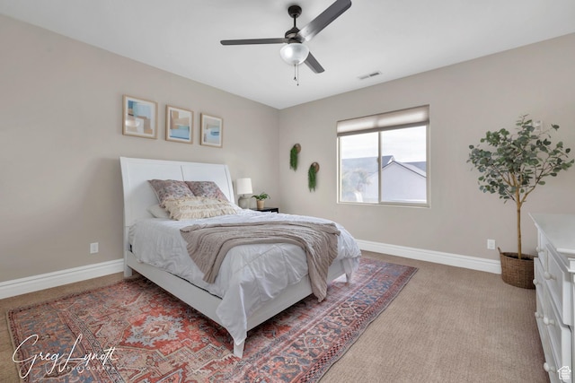 395 W Granite Dr, Washington, UT 84780 - bedroom featuring baseboards, light carpet, and a ceiling fan