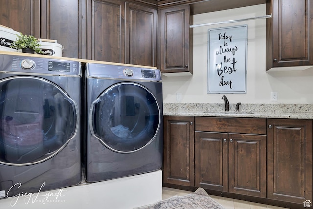 395 W Granite Dr, Washington, UT 84780 - washroom featuring washer and clothes dryer and cabinet space