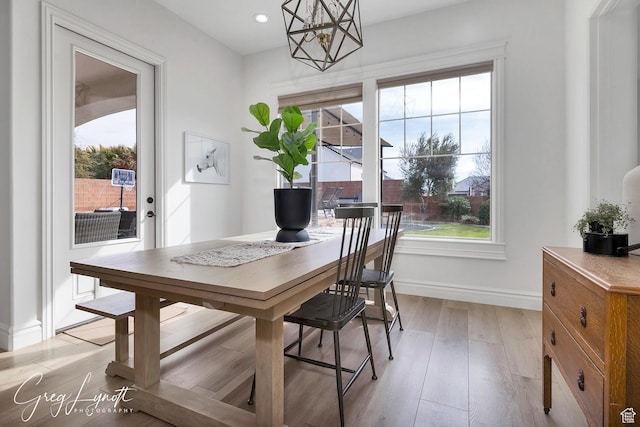 395 W Granite Dr, Washington, UT 84780 - dining area with healthy amount of natural light, a chandelier, baseboards, light wood finished floors, and recessed lighting