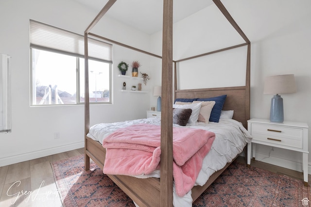 395 W Granite Dr, Washington, UT 84780 - bedroom with wood finished floors and baseboards