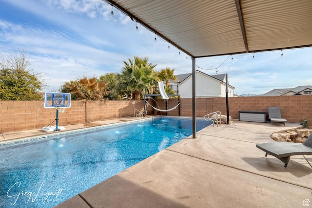 395 W Granite Dr, Washington, UT 84780 - view of pool with a patio, a fenced backyard, and a water slide