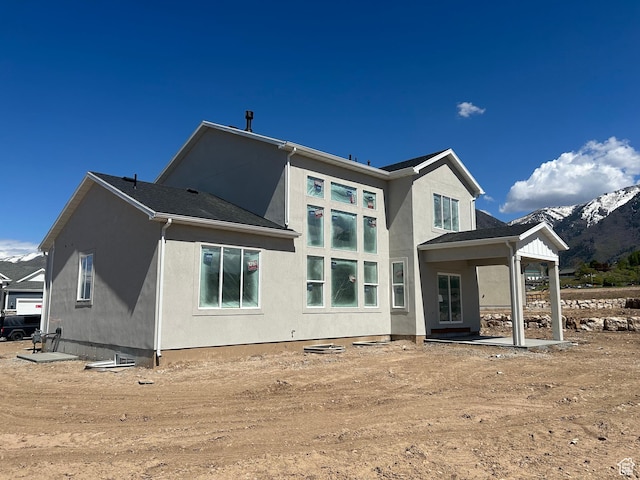 1678 S 130 W Unit 48, Salem, UT 84653 - rear view of house featuring stucco siding and a mountain view