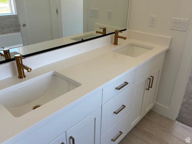 1678 S 130 W Unit 48, Salem, UT 84653 - bathroom with double vanity and wood finished floors