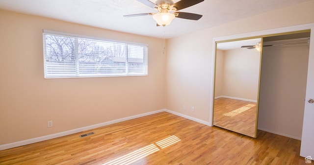3664 W 3965 S, West Valley City, UT 84120 - unfurnished bedroom featuring baseboards, visible vents, ceiling fan, wood finished floors, and a closet