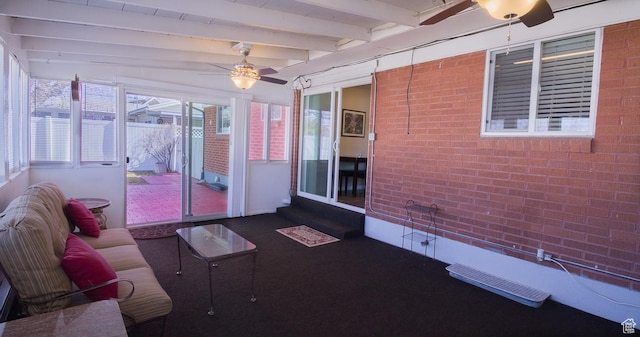 3664 W 3965 S, West Valley City, UT 84120 - unfurnished living room featuring ceiling fan, brick wall, and beamed ceiling