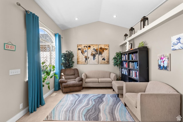 sitting room featuring light carpet, visible vents, baseboards, lofted ceiling, and recessed lighting
