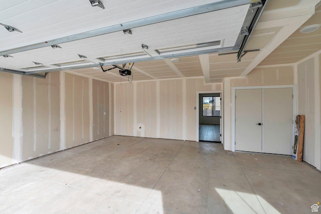 5328 W Dosh Ln Unit 40, Highland, UT 84003 - garage featuring a garage door opener