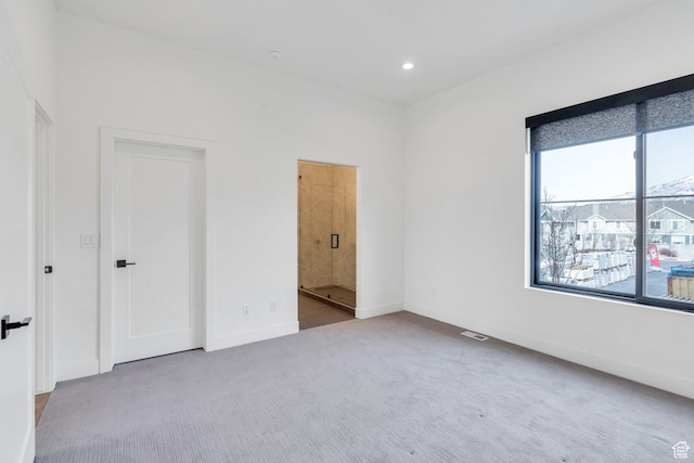 5328 W Dosh Ln Unit 40, Highland, UT 84003 - unfurnished bedroom featuring recessed lighting, visible vents, ensuite bathroom, carpet flooring, and baseboards