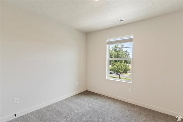 818 W 1100 N Unit 140, North Salt Lake, UT 84054 - unfurnished room featuring carpet and a textured ceiling