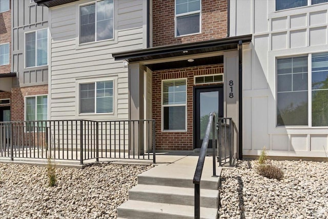 818 W 1100 N Unit 140, North Salt Lake, UT 84054 - entrance to property featuring brick siding and board and batten siding