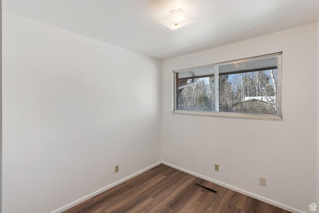 2047 N 1350 E, North Logan, UT 84341 - unfurnished room featuring dark wood-style floors and baseboards