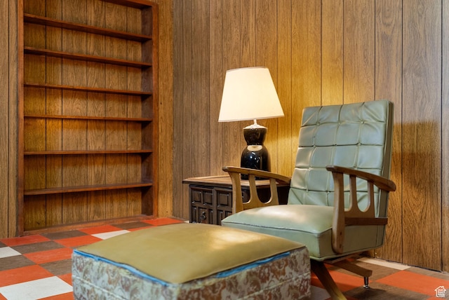 2047 N 1350 E, North Logan, UT 84341 - sitting room with wood walls, tile patterned floors, and built in features