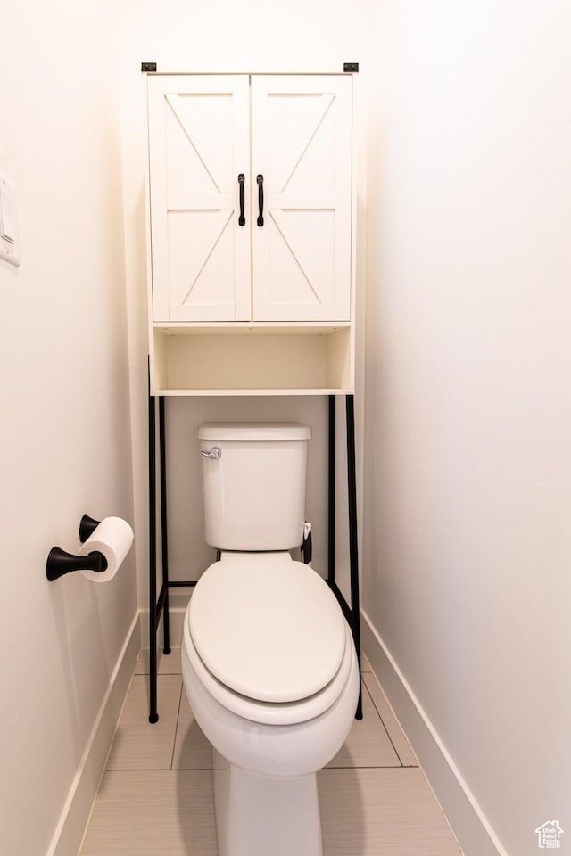 695 W Claystone Dr, St George, UT 84790 - bathroom featuring tile patterned flooring, toilet, and baseboards