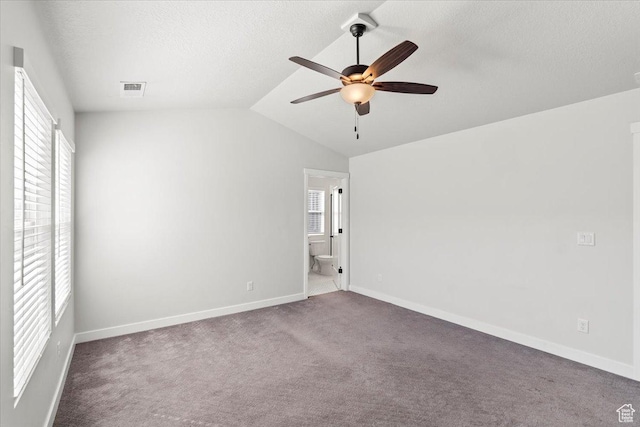 5927 W Lake Ave S, South Jordan, UT 84009 - unfurnished bedroom featuring carpet, multiple windows, vaulted ceiling, and visible vents