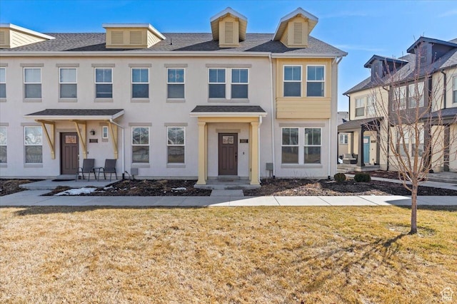 5927 W Lake Ave S, South Jordan, UT 84009 - townhome / multi-family property with a front lawn and stucco siding
