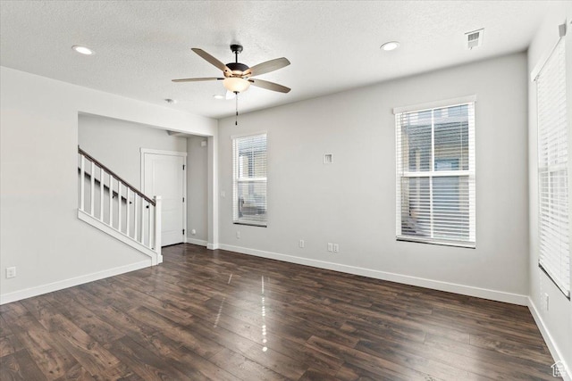 5927 W Lake Ave S, South Jordan, UT 84009 - empty room featuring baseboards, a textured ceiling, stairway, and wood finished floors