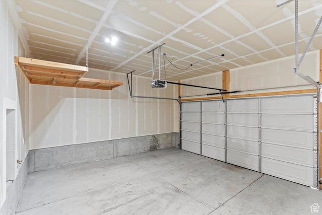 5927 W Lake Ave S, South Jordan, UT 84009 - garage featuring a garage door opener