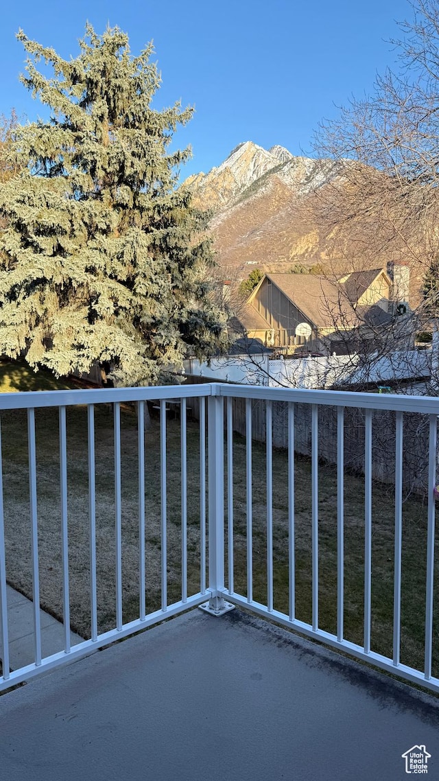 balcony featuring a mountain view