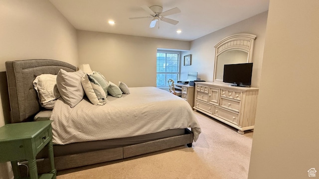 bedroom with ceiling fan, recessed lighting, and light colored carpet